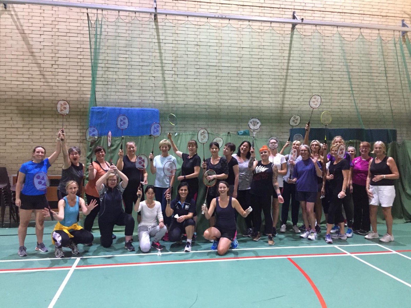 Players warming up at a women's-only badminton session